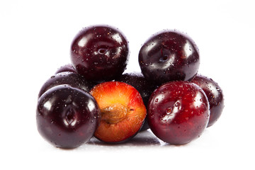 plums isolated on white background