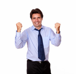 Adult hispanic businessman celebrating his victory