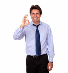 Fashionable businessman standing with ok sign