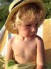 baby girl wearing strawhat