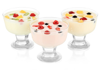 Delicious yogurt with fruit isolated on white