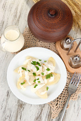Tasty dumplings with fried onion