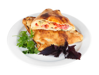 Pizza calzone on table isolated on white