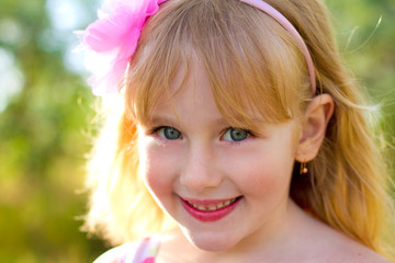 Portrait of cute little girl close-up