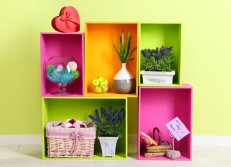 Shelves of different bright colors with decorative addition