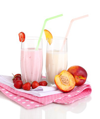 Delicious milk shakes with strawberries and peach isolated