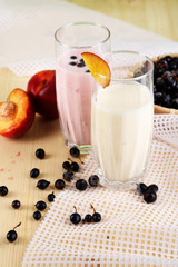 Delicious milk shakes with blackberry and peach