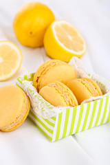 Macaroons on white cloth close-up