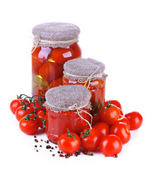 Tasty canned and fresh tomatoes, isolated on white