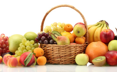 Fototapeta na wymiar Assortment of exotic fruits in basket isolated on white