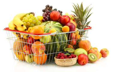 Assortment of exotic fruits in metal basket and berries