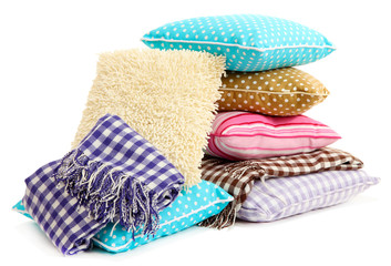 Hill colorful pillows and plaids isolated on white