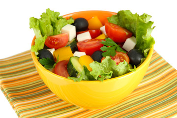 Tasty Greek salad isolated on white