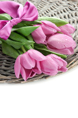 Obraz na płótnie Canvas Beautiful bouquet of purple tulips, isolated on white