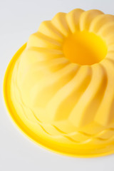 Modern silicone cake form isolated on white background