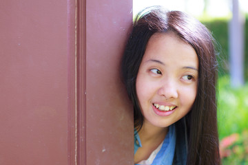 woman in jeans shirt smiling