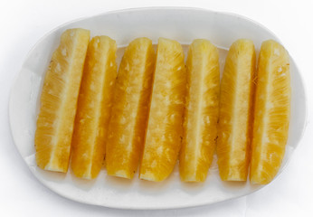 sliced pineapple isolated on white background