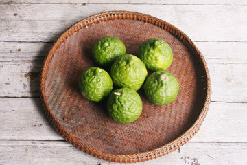 Bergamots in the threshing basket on wooden table