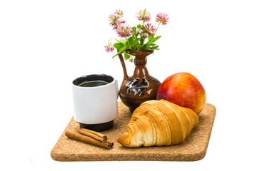 Breakfast wirh coffee and croissant