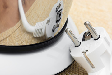 Mirror reflection of electrical plug © vrabelpeter1