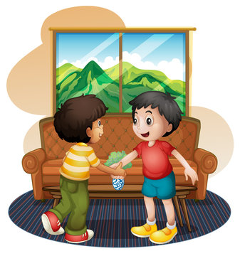 Two boys shaking hands near the sofa