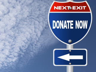 Donate now road sign