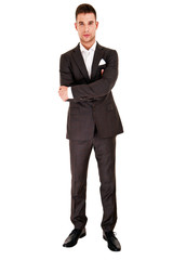 Young handsome man in black suit and glasses smiling isolated