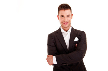 Young handsome man in black suit and glasses smiling isolated