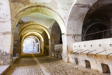 Fototapeta na wymiar Stables in the dungeon of Sant Ferran Castle