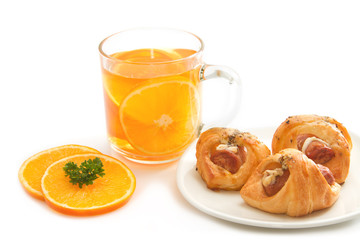 Tea break, orange tea with little  croissant