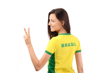 Victory for Brazil.Girl with Brasil written on her t-shirt.