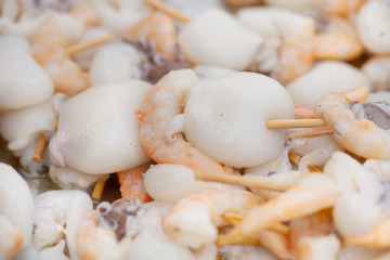 spiedini of fish on the grill