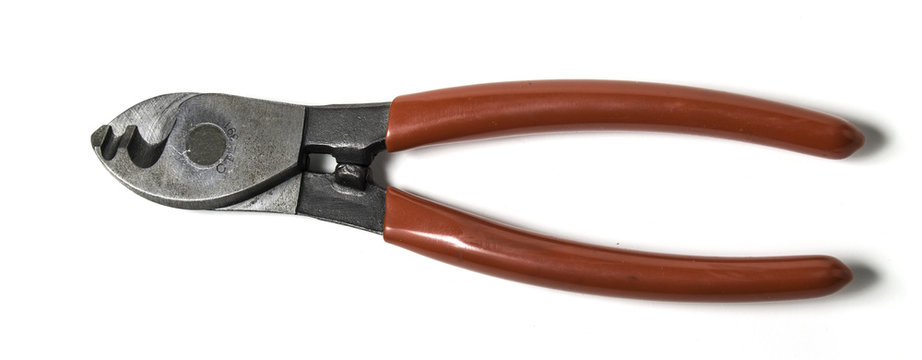Red wire cutter on white background