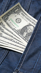 Banknotes dollars in jeans pocket