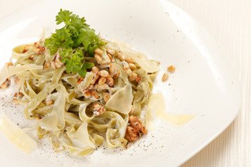 pasta with cream cheese and cedar nuts
