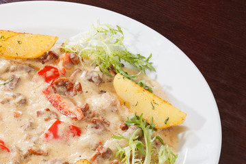 meat with sauce and vegetables