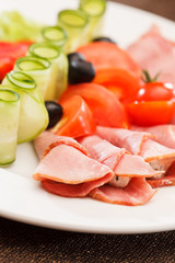 Meat appetizer with vegetables