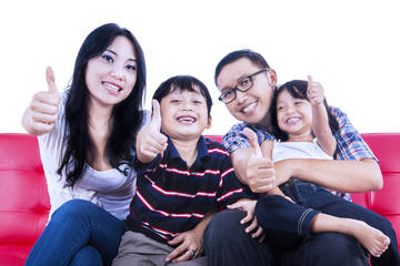 Fototapeta premium Happy family give thumbs up - isolated