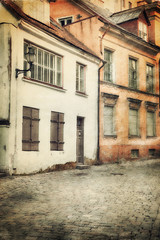 Fototapeta na wymiar Retro style image of old european street