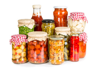 Fototapeta na wymiar Marinated vegetables in glass jars