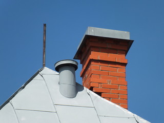 Iron roof and red chimney