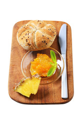 Whole grain bun with marmalade