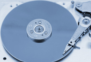 Open computer hard drive on white background