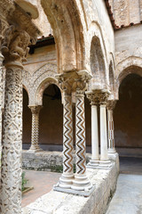 Capitels, columns and arches in Monreale cloister Sicily