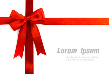 Shiny red ribbon on white background with copy space.