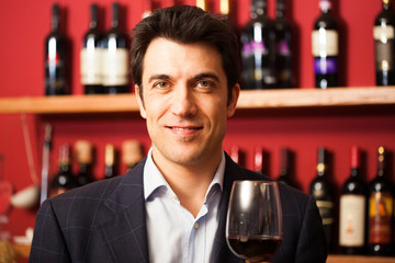 Sommelier tasting a wine glass