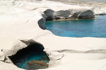 Caves and rock formations by the sea at Sarakiniko area on Milos - 54313358