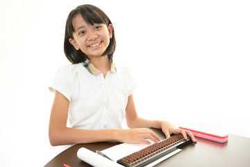 そろばん塾へ通う女の子