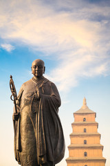 monk xuanzang statue with big wild goose pagoda © chungking