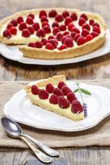 Raspberry tart on wooden table